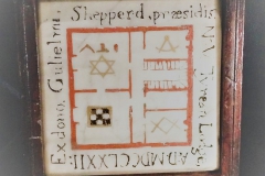 Плитка с символами масонов.