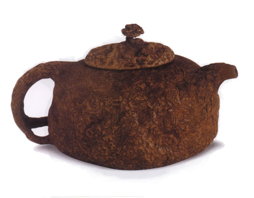 чайник в форме капа автор Гун Чунь